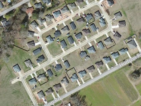 Aerial view of the same Alsace Lorraine area in 2011, filled with newly built homes